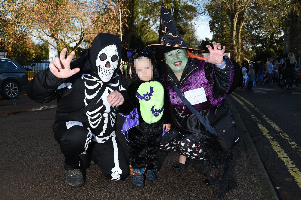 Photograph: Family group in Halloween costumes.